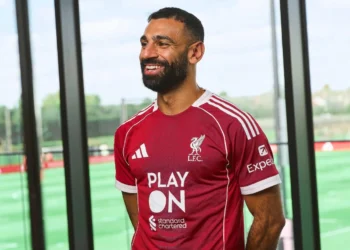 Standard Chartered champions ‘Play On’ on Liverpool kit