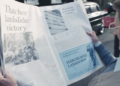 Still from Harsgreaves Lansdown advert. Newspaper showing Thatcher's victory and an advert for Hargreaves Lansdown
