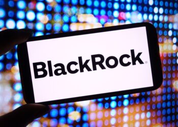 BlackRock logo in front of stocks background