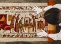 Mastercard weaves 3,000 years of payments history into artwork